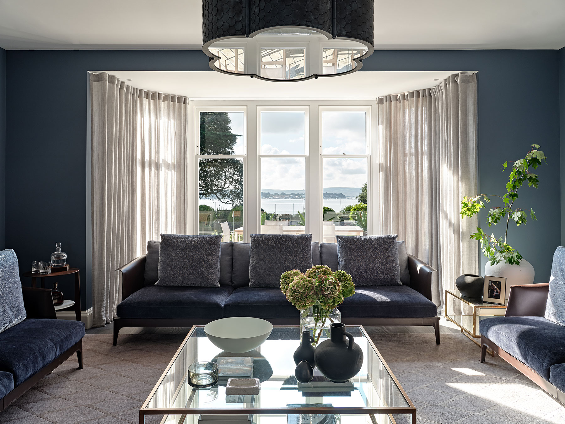 Drawing Room with view out over water of LEIVARS Sandbanks project, 1930s Family Home